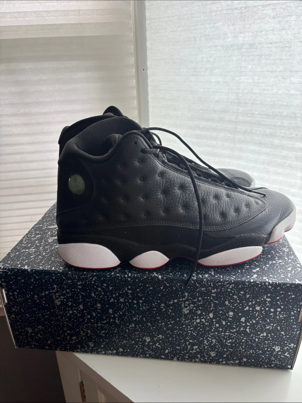 Air Jordan 4 Black/White/Red Retro High-Top Sneakers